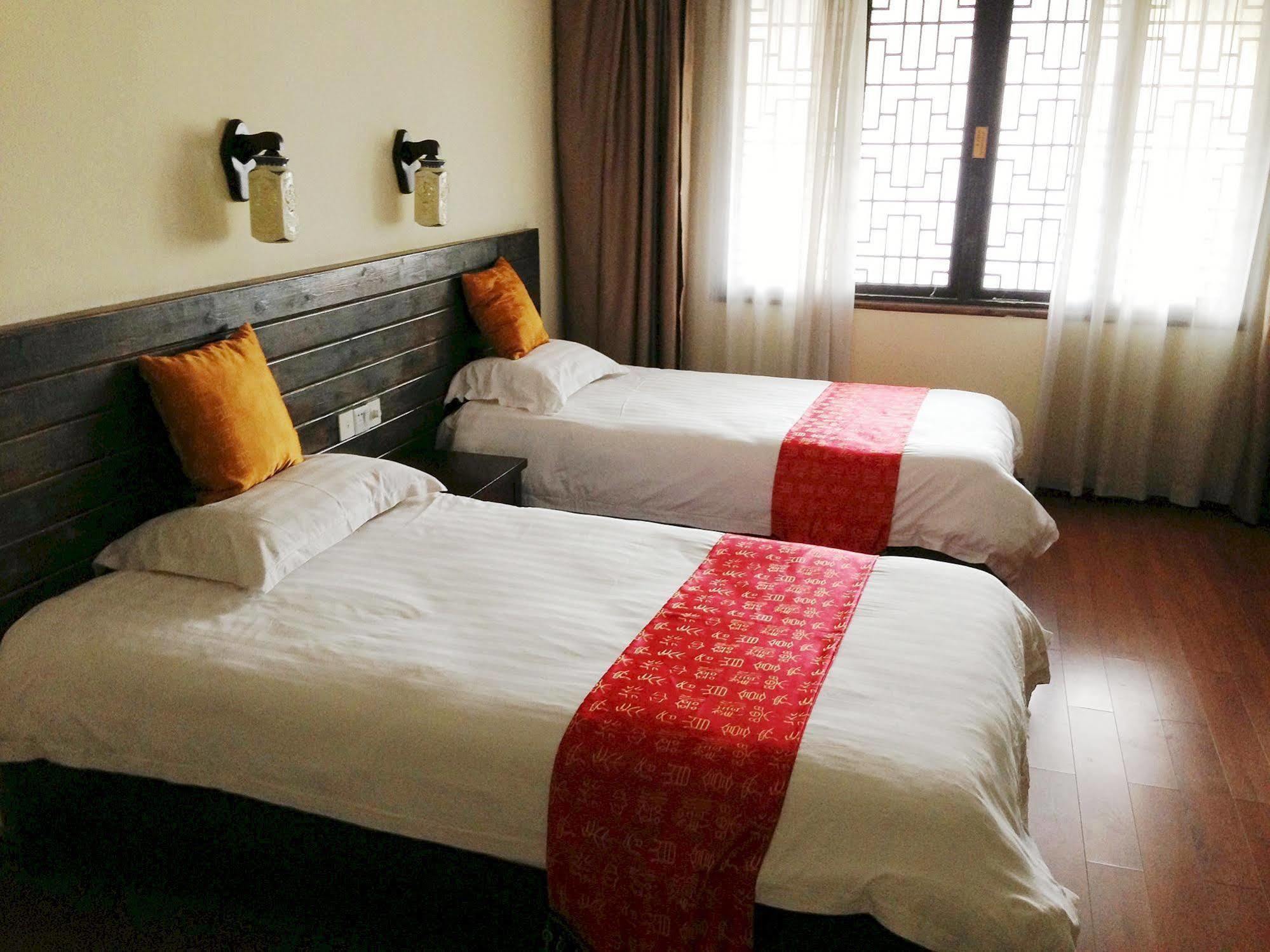 Bajie Youth Hostel Чжанцзяцзе Экстерьер фото